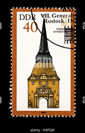 Postage stamp from East Germany (DDR) depicting a stone door at Rostock Stock Photo