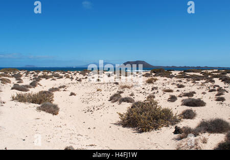 Fuerteventura, Canary Islands, North Africa, Spain: panoramic view of the beach of Grandes Playas with Lobos Island and Lanzarote on the background Stock Photo