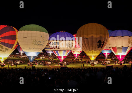 Hot air balloons lined up for 2016 Bristol Balloon Fiesta night glows Stock Photo