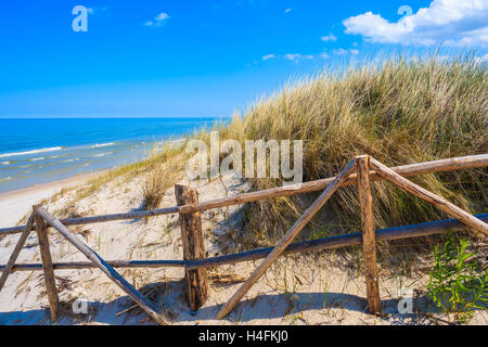 Entrance to idyllic sandy beach in Bialogora coastal village, Baltic Sea, Poland Stock Photo