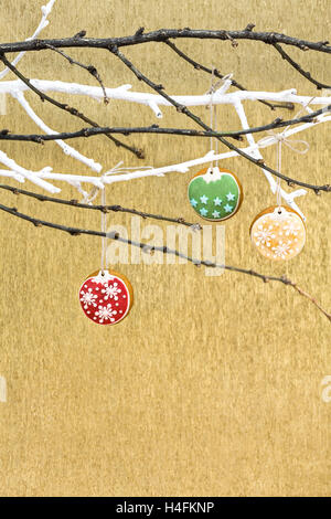 christmas homemade gingerbread cookies on golden background Stock Photo