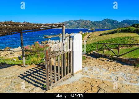 Gate to house on coast of Cala Caterina bay, Sardinia island, Italy Stock Photo