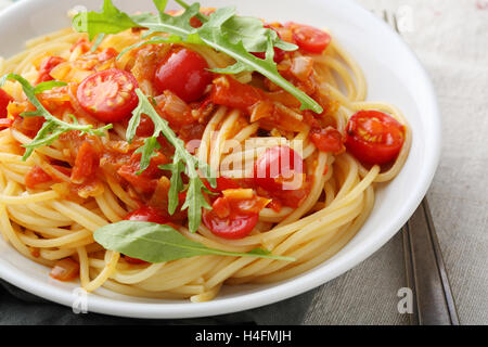 Italian pasta with tomato sauce, food close-up Stock Photo