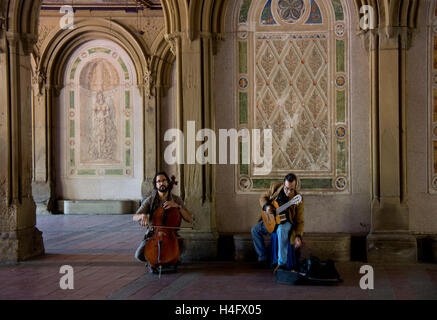 Two musicians performing in Bethesda Terrace at Central Park, Manhattan, NYC. Stock Photo