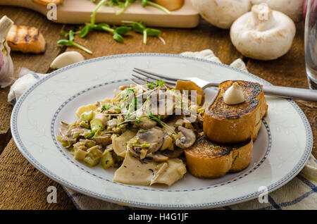 Mushroom, Leek and Tarragon Pasta, all organic, no chemistry, eat clean, garlic toast Stock Photo