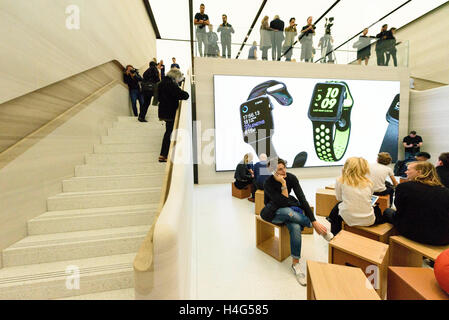 London, UK. 15th October, 2016. Customers shopping inside the Apple store in Regent Street with a new exterior and interior design concept by Foster + Partners 15 Oct 2016 Credit:  Raymond Tang/Alamy Live News Stock Photo
