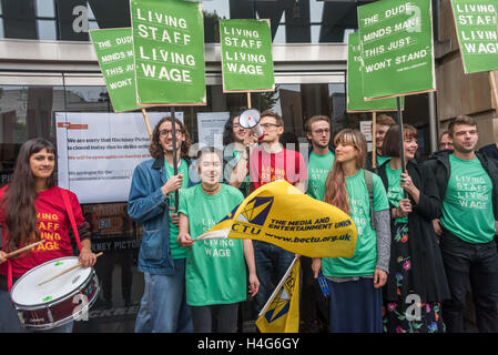 London, UK. 15 October 2016. Striking staff at Hackney Picturehouse protest outside the cinema demanding management pay them a living wage, give adequate sick pay, maternity and paternity pay and recognise their chosen trade union BECTU. Picturehouse is owned by Cineworld, whose 2015 profits were £81.3m after tax, and the group insists that workers are represented by the Picturehouse Staff Forum. Workers at the Ritzy are the only ones in the group represented by a trade union. Peter Marshall/Alamy Live News Stock Photo