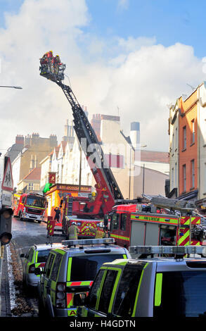 Bristol, UK. 16th October, 2016. St Michael's on the Mount Church Without, a grade II listed building from the seventeen hundreds in central Bristol, England, UK, located on St Michael's Hill,  16 October 2016.  Multiple fire engines including two ladder rigs, a number of ambulances and police attended the fire. The church has been boarded up for 17 years with temporary uses during this time but had squatters and graffiti taggers broke in a few days ago.  The roof and much of interior has been destroyed. The cause of the fire is not yet known. Credit: Charles Stirling/Alamy Live News Stock Photo