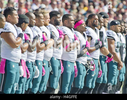 Landover, Maryland, USA. 16th Oct, 2016. Philadelphia Eagles players show their respect for the United States of America as the National Anthem is sung prior to the game against the Washington Redskins at FedEx Field in Landover, Maryland on Sunday, October 16, 2016.Credit: Ron Sachs/CNP © Ron Sachs/CNP/ZUMA Wire/Alamy Live News Stock Photo