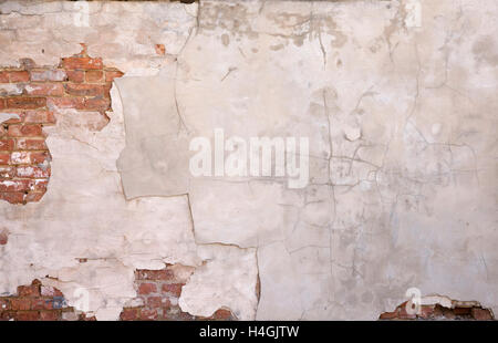 'Painted Wall Background #1'  Plastered painted wall with exposed brick. Stock Photo