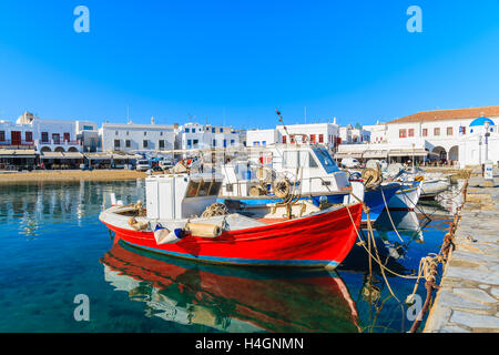 Greek fishing boats mooring in Mykonos port on island of Mykonos, Cyclades, Greece Stock Photo