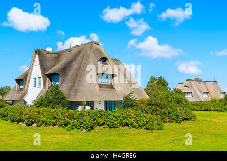 Typical Frisian houses with thatched roofs on Sylt island in Keitum village, Germany Stock Photo