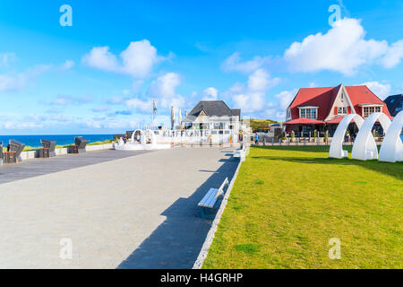 SYLT ISLAND, GERMANY - SEP 11, 2016: Beach chairs on coastal promenade in Wenningstedt village, Sylt island, Germany. Stock Photo