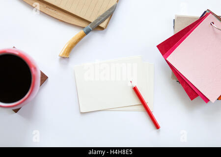 White office desk with color fabric patterns on it Stock Photo