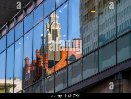 Manchester victorian gilded architectural skyline, building reflections mirrored glass wall images of Brown Street, Greater Manchester, UK Stock Photo