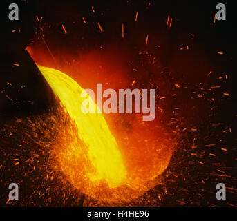 Molten steel pouring being poured into a Bessemer converter in a Welsh steel works foundry viewed from a close elevated position Ian Shaw Kodak Photographer. Kodak Film Press Advertising for High Speed Ektachrome Stock Photo