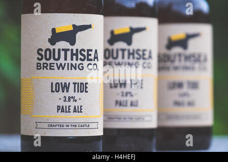 Low Tide Pale Ale, brewed by Southsea Brewing Co. which is an artisan brewery located in an old ammunition storage room within the walls of a coastal defence fort built by King Henry VIII in 1544. Stock Photo