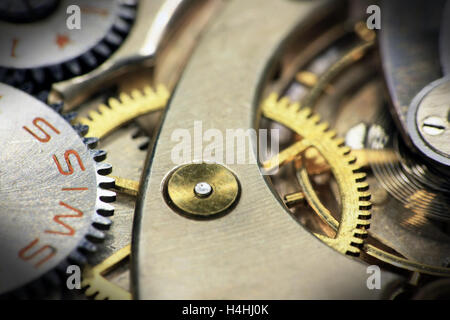 Old swiss made pocket watch inside mechanism close up Stock Photo