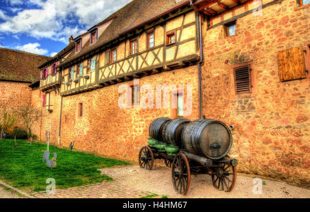 Cart with wine barrels in Riquewihr - Alsace, France Stock Photo