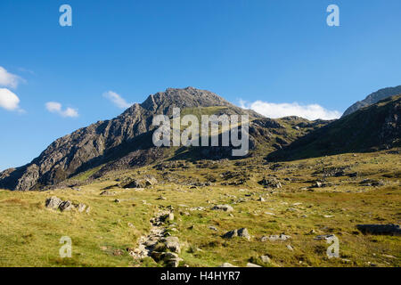 Path to Mount Tryfan showing profile of North Ridge and Bristly Ridge from west side in Snowdonia National Park. Ogwen Wales UK Britain Stock Photo