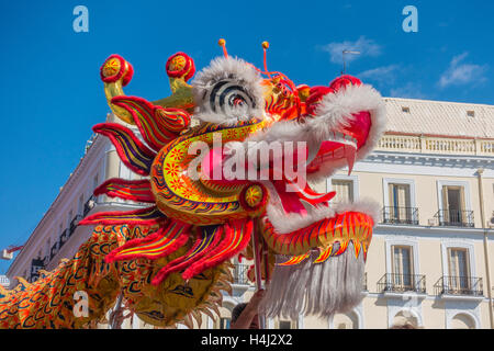 Close-up of dragon's head in the Chinese dragon dance in Puerta del Sol, Madrid, Spain. Stock Photo