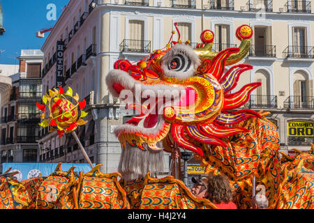 Chinese dragon dance in Puerta del Sol, Madrid, Spain. Stock Photo