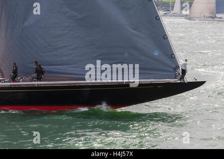 Big close-up of the bows of J-Class yacht 'Rainbow' manoeuvring before the start of a Solent race. Stock Photo