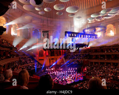 Royal Albert Hall, dramatic light smoke performance interior auditorium audience sound & spectacular fireworks light effects Kensington London UK Stock Photo