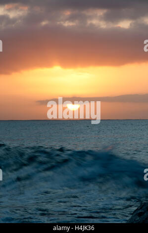 Sunrise, water and waves on the coast, Blue Hour, Riviera, Liguria, Italy, Europe Stock Photo
