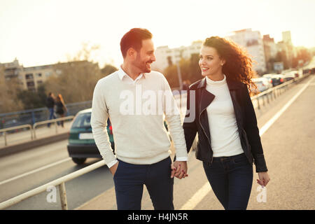 Beautiful couple exploring city and bonding Stock Photo