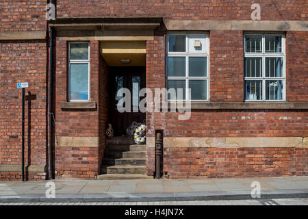 The belongings of a rough sleeper left in a doorway Stock Photo