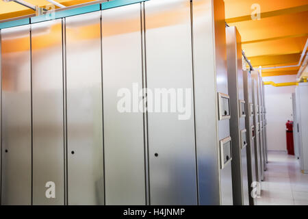 Hallway with a row of servers Stock Photo
