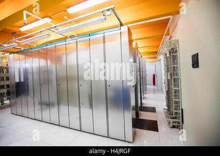 Hallway with a row of servers Stock Photo