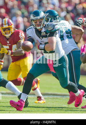 Philadelphia Eagles quarterback Carson Wentz (11) looks to hand off the ball early in the first quarter against the Washington Redskins at FedEx Field in Landover, Maryland on Sunday, October 16, 2016. Credit: Ron Sachs/CNP /MediaPunch Stock Photo