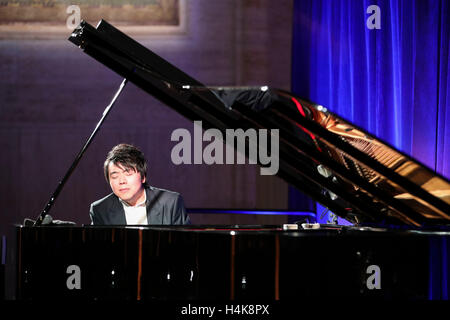 Chinese pianist Lang Lang performs music during the shooting of