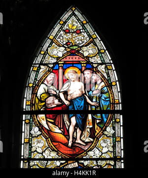 Thomas touching the spear wound of Jesus, by Ward  & Hughes, 1869, stained glass window, Stanhoe, Norfolk England UK Stock Photo