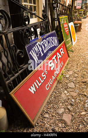 England, Berkshire, Hungerford, High Street, Below Stairs, antiques centre, old Wills Star cigarette advertising signs for sale Stock Photo