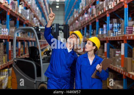 Warehouse workers checking the inventory Stock Photo