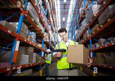 Warehouse worker using scanner Stock Photo