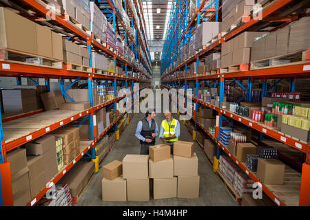 Warehouse workers checking the inventory Stock Photo