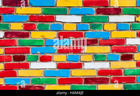 Colorful brick wall from multicolored bricks as a creative background Stock Photo
