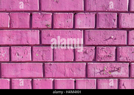 Old weathered pink brick wall as a creative background Stock Photo