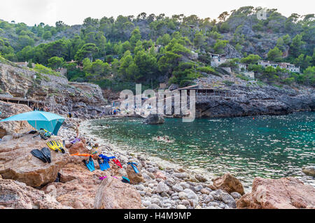 Beach Cala Deia at coast of Mallorca in Tramuntana mountains, Baleares, Spain Stock Photo