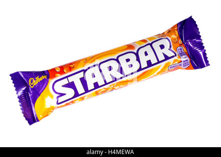 LONDON, UK - OCTOBER 13TH 2016: An unopened Starbar chocolate bar manufactured by Cadbury. Stock Photo