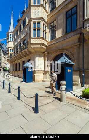 LUXEMBOURG - APRIL 7, 2008:  A soldier guards the entrance to Palais Grand-Ducal, official residence of the Grand Duke Stock Photo