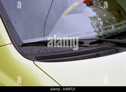 Closeup of car wiper in a rainy autumn day Stock Photo