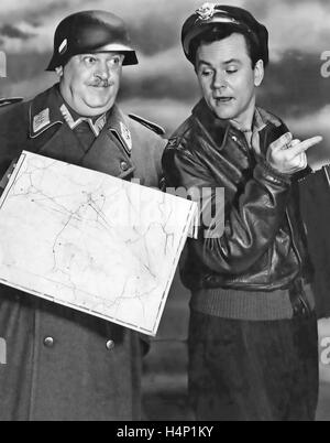 HOGAN'S HEROES CBS TV series 1965-1971 with Bob Crane at right as Hogan and  John Banner as Schultz in 1965 Stock Photo