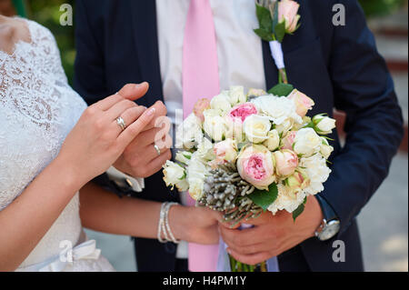 bride and groom holding hands in wedding day Stock Photo