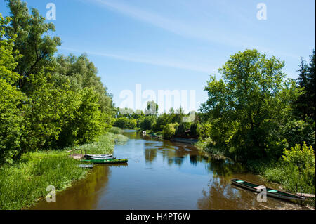 A channel of Narew river flowing through Pultusk, a historical town in Mazovia district of Poland. Stock Photo