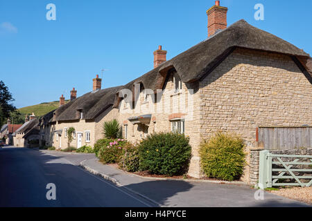 Traditional thatched cottages in the village of West Lulworth in Dorset, England United Kingdom UK Stock Photo